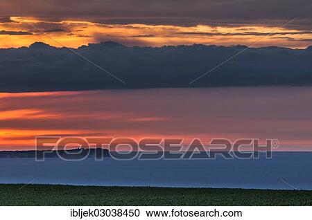 "Views towards Cape Arkona with a lighthouse at sunset, nahe Lohme, Rugen island, Rugen, Mecklenburg-Western Pomerania, Germany, Europe" View Large Photo Image Stock Image - "Views towards Cape Arkona with a lighthouse at sunset, nahe Lohme, Rugen island, Rugen, Mecklenburg-Western Pomerania, Germany, Europe". Fotosearch