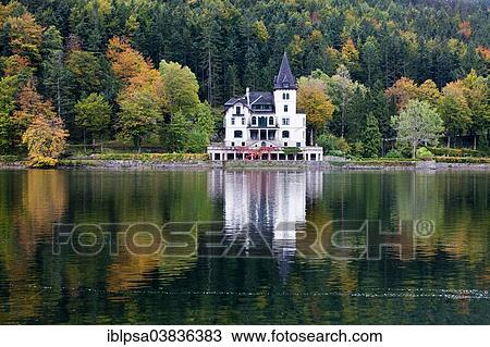 Stock Image - "Villa Castiglioni in autumn, Grundlsee Lake, Ausseerland region, Salzkammergut, Styria, Austria, Europe". Fotosearch
