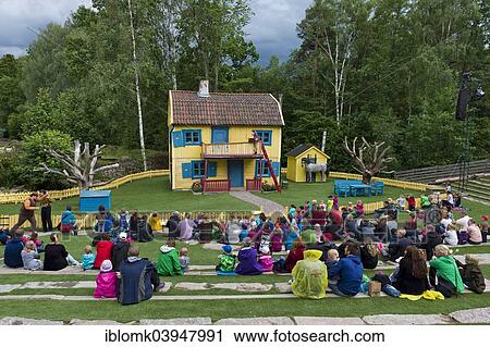 "Villa Villekulla, viewers watching a scene from the children's book """"Pippi Longstocking"""" by children's author Astrid Lindgren, Astrid Lindgren's World World theme park, Vimmerby, Smaland, Sweden, Europe" View Large Photo Image Stock Image - "Villa Villekulla, viewers watching a scene from the children's book """"Pippi Longstocking"""" by children's author Astrid Lindgren, Astrid Lindgren's World World theme park, Vimmerby, Smaland, Sweden, Europe". Fotosearch