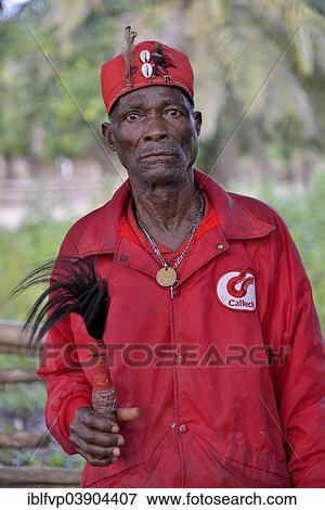 "Village elder of Nkala wearing the typical red robe, Nkala, Bandundu Province, Democratic Republic of the Congo" View Large Photo Image Stock Photo - "Village elder of Nkala wearing the typical red robe, Nkala, Bandundu Province, Democratic Republic of the Congo". Fotosearch