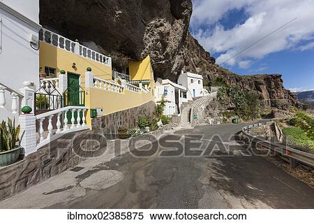 "Village of Acusa Verde with houses that have been built into the mountain, Tejeda Region, Gran Canaria, Canary Islands, Spain, Europe, PublicGround, Europe" View Large Photo Image Stock Photography - "Village of Acusa Verde with houses that have been built into the mountain, Tejeda Region, Gran Canaria, Canary Islands, Spain, Europe, PublicGround, Europe". Fotosearch