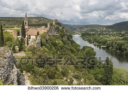 "Village of Aigueze, Les Plus Beaux Villages de France, at the entrance of the Ardeche Gorges, Aigueze, Languedoc-Roussillon, France, Europe" View Large Photo Image Stock Photograph - "Village of Aigueze, Les Plus Beaux Villages de France, at the entrance of the Ardeche Gorges, Aigueze, Languedoc-Roussillon, France, Europe". Fotosearch
