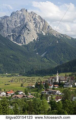 "Village of Lermoos in Ehrwalder Becken in front of Gruenstein Mountain, Ehrwald, Tyrol, Austria, Europe" View Large Photo Image Stock Image - "Village of Lermoos in Ehrwalder Becken in front of Gruenstein Mountain, Ehrwald, Tyrol, Austria, Europe". Fotosearch