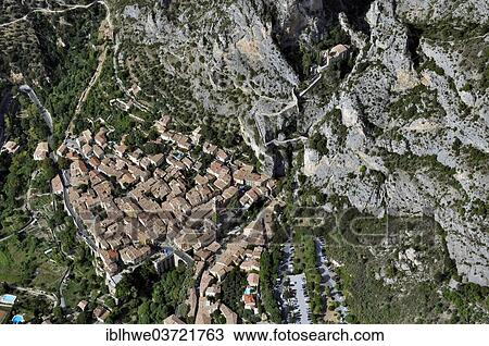 "Village of Moustiers-Sainte-Marie, aerial view, Seealpen, Moustiers-Sainte-Marie, Departement Alpes-de-Haute-Provence, Region Provence-Alpes-Cote d’Azur, France, Europe" View Large Photo Image Stock Image - "Village of Moustiers-Sainte-Marie, aerial view, Seealpen, Moustiers-Sainte-Marie, Departement Alpes-de-Haute-Provence, Region Provence-Alpes-Cote d’Azur, France, Europe". Fotosearch