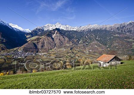 "Village of Partschins, with the Tschigot Mountains at the rear, Vinschgau, South Tyrol province, Trentino-Alto Adige, Italy, Europe" View Large Photo Image Stock Image - "Village of Partschins, with the Tschigot Mountains at the rear, Vinschgau, South Tyrol province, Trentino-Alto Adige, Italy, Europe". Fotosearch