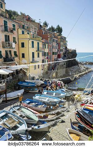 "Village with colorful houses by the sea, Riomaggiore, Cinque Terre, UNESCO World Heritage Site, Province of La Spezia, Liguria, Italy, Europe" View Large Photo Image Picture - "Village with colorful houses by the sea, Riomaggiore, Cinque Terre, UNESCO World Heritage Site, Province of La Spezia, Liguria, Italy, Europe". Fotosearch