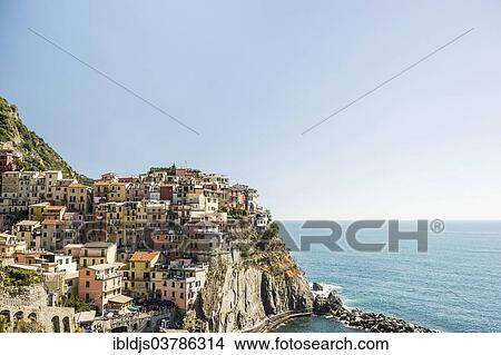 Picture - "Village with colorful houses by the sea, Manarola, Cinque Terre, UNESCO World Heritage Site, Province of La Spezia, Liguria, Italy, Europe". Fotosearch