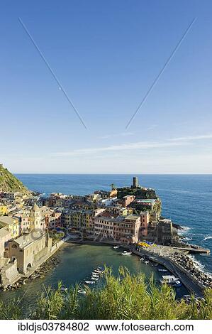 Stock Image - "Village with colorful houses by the sea, Vernazza, Cinque Terre, La Spezia Province, Liguria, Italy, Europe". Fotosearch