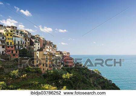 "Village with colorful houses by the sea, Corniglia, Cinque Terre, UNESCO World Heritage Site, Province of La Spezia, Liguria, Italy, Europe" View Large Photo Image Stock Image - "Village with colorful houses by the sea, Corniglia, Cinque Terre, UNESCO World Heritage Site, Province of La Spezia, Liguria, Italy, Europe". Fotosearch