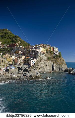"Village with colorful houses by the sea, Manarola, Cinque Terre, UNESCO World Heritage Site, Province of La Spezia, Liguria, Italy, Europe" View Large Photo Image Stock Photograph - "Village with colorful houses by the sea, Manarola, Cinque Terre, UNESCO World Heritage Site, Province of La Spezia, Liguria, Italy, Europe". Fotosearch