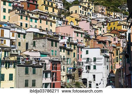 Stock Image - "Village with colorful houses, Riomaggiore, Cinque Terre, UNESCO World Heritage Site, Province of La Spezia, Liguria, Italy, Europe". Fotosearch