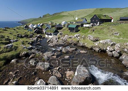"Village with houses mostly in the traditional Faroese style, wood on a stone base with a sod roof, Mykines, Mykines, Faroe Islands, Denmark, Europe" View Large Photo Image Stock Image - "Village with houses mostly in the traditional Faroese style, wood on a stone base with a sod roof, Mykines, Mykines, Faroe Islands, Denmark, Europe". Fotosearch