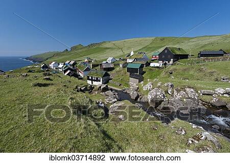 "Village with houses mostly in the traditional Faroese style, wood on a stone base with a sod roof, Mykines, Mykines, Faroe Islands, Denmark, Europe" View Large Photo Image Stock Image - "Village with houses mostly in the traditional Faroese style, wood on a stone base with a sod roof, Mykines, Mykines, Faroe Islands, Denmark, Europe". Fotosearch