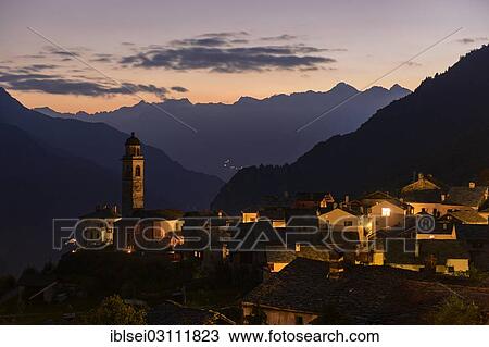 Stock Image - "Village with old stone houses at dusk, Soglio, Bergell, Canton of Graubunden, Switzerland, Europe". Fotosearch