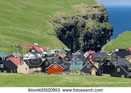 "Village with typical colourful houses, cliffs at back, Gjogv, Eysturoy, Faroe Islands, Denmark, Europe" View Large Photo Image Stock Image - "Village with typical colourful houses, cliffs at back, Gjogv, Eysturoy, Faroe Islands, Denmark, Europe". Fotosearch