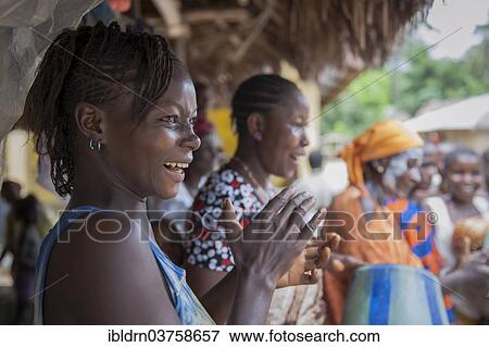 "Villagers celebrating a festival with traditional dance and music, Tiwai Island, Southern Province, Sierra Leone, Africa" View Large Photo Image Stock Photo - "Villagers celebrating a festival with traditional dance and music, Tiwai Island, Southern Province, Sierra Leone, Africa". Fotosearch