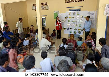 "Villagers participating in hygiene training run by a charity organisation using illustrations to display causes and consequences of poor hygiene, Trapang Village, Bathi District, Takeo Province, Cambodia, Asia" View Large Photo Image Stock Photography - "Villagers participating in hygiene training run by a charity organisation using illustrations to display causes and consequences of poor hygiene, Trapang Village, Bathi District, Takeo Province, Cambodia, Asia". Fotosearch