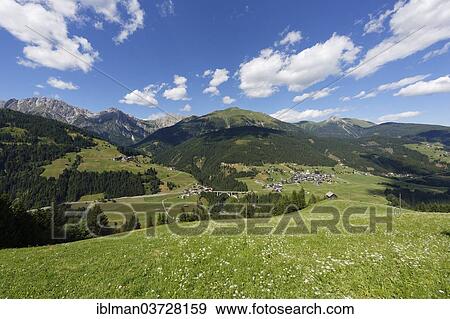 "Villages of Xaveriberg, Wiesen and St. Lorenzen, in front of the Lienz Dolomites with Riebenkofel Mountain, Lesachtal, Bezirk Hermagor, Karnten, Austria, Europe" View Large Photo Image Stock Photo - "Villages of Xaveriberg, Wiesen and St. Lorenzen, in front of the Lienz Dolomites with Riebenkofel Mountain, Lesachtal, Bezirk Hermagor, Karnten, Austria, Europe". Fotosearch