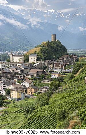 "Vineyards and the Bayart Tower on a hill, Saillon, Martigny, Canton of Valais, Switzerland, Europe" View Large Photo Image Stock Photography - "Vineyards and the Bayart Tower on a hill, Saillon, Martigny, Canton of Valais, Switzerland, Europe". Fotosearch