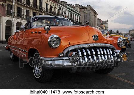 "Vintage Buick from the 1950s on the Prado at dusk, Havana, Cuba, North America" View Large Photo Image Stock Photo - "Vintage Buick from the 1950s on the Prado at dusk, Havana, Cuba, North America". Fotosearch