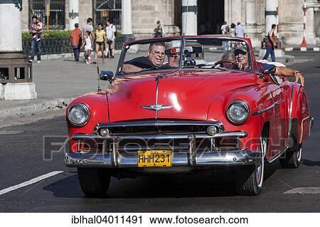 Stock Image - "Vintage car on the Prado, Havana, Cuba, North America". Fotosearch