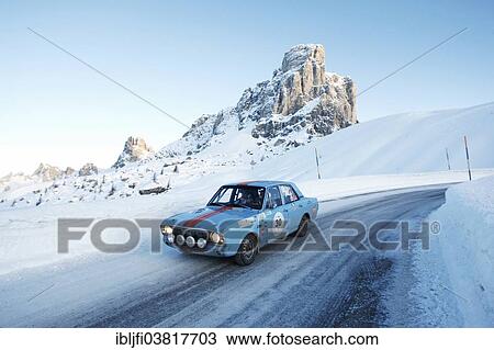 Stock Image - "Vintage car rally, WinterRAID 2013, Ford Lotus Cortina MK II, built in 1968, Passo di Giau pass, Belluno, Italy, Europe". Fotosearch
