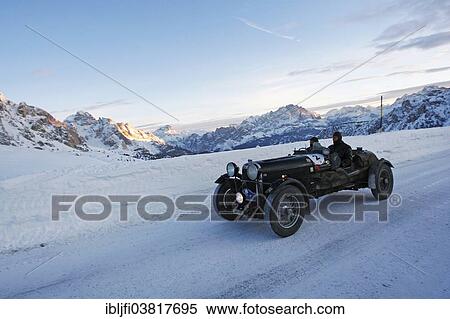 Stock Photography - "Vintage car rally, WinterRAID 2013, Lagonda M35 Le Mans Rapide, built in 1934, Passo di Giau pass, Belluno, Italy, Europe". Fotosearch