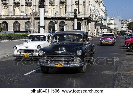 "Vintage cars on the Prado, Havana, Cuba, North America" View Large Photo Image Stock Photograph - "Vintage cars on the Prado, Havana, Cuba, North America". Fotosearch