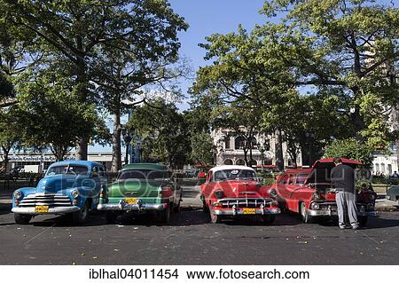 "Vintage cars, Parque de la Fraternidad Americana, Havana, Cuba, North America" View Large Photo Image Picture - "Vintage cars, Parque de la Fraternidad Americana, Havana, Cuba, North America". Fotosearch