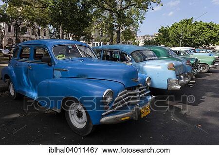 "Vintage cars, Parque de la Fraternidad Americana, Havana, Cuba, North America" View Large Photo Image Stock Photo - "Vintage cars, Parque de la Fraternidad Americana, Havana, Cuba, North America". Fotosearch