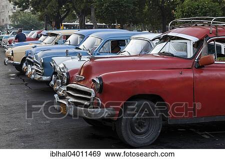Stock Photo - "Vintage cars, Parque de la Fraternidad Americana, Havana, Cuba, North America". Fotosearch