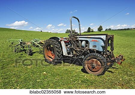 Stock Photo - "Vintage Eicher tractor on a meadow near Kempten, Allgaeu region, Bavaria, Germany, Europe". Fotosearch