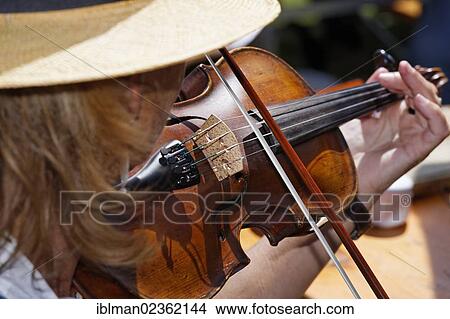 "Violin player, Genussgeiger from Ischl in Upper Austria, Pfeifertag festival on Niedergadenalm alp, Strobl, Salzburg state, Salzkammergut resort area, Austria, Europe" View Large Photo Image Picture - "Violin player, Genussgeiger from Ischl in Upper Austria, Pfeifertag festival on Niedergadenalm alp, Strobl, Salzburg state, Salzkammergut resort area, Austria, Europe". Fotosearch