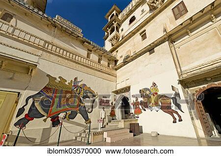 Stock Image - "Visitor entrance to the City Palace of the Maharana of Udaipur, with painted walls, Udaipur, Rajasthan, India, Asia". Fotosearch