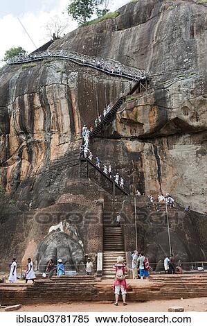 "Visitors climbing the steep stairs to the rock fortress of Sigiriya, UNESCO World Heritage Site, Sigiriya, Sri Lanka, Asia" View Large Photo Image Stock Photography - "Visitors climbing the steep stairs to the rock fortress of Sigiriya, UNESCO World Heritage Site, Sigiriya, Sri Lanka, Asia". Fotosearch