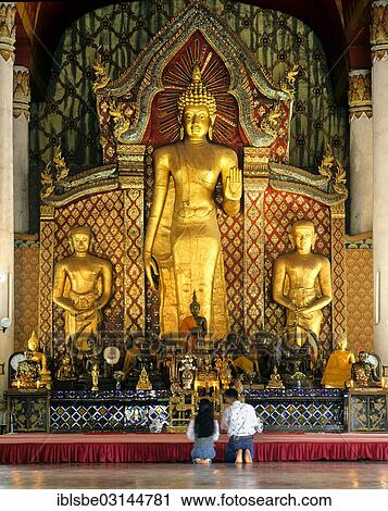 "Visitors in front of the Golden Buddha of Wat Chedi Luang Temple, Chiang Mai, Northern Thailand, Thailand, Asia" View Large Photo Image Stock Image - "Visitors in front of the Golden Buddha of Wat Chedi Luang Temple, Chiang Mai, Northern Thailand, Thailand, Asia". Fotosearch