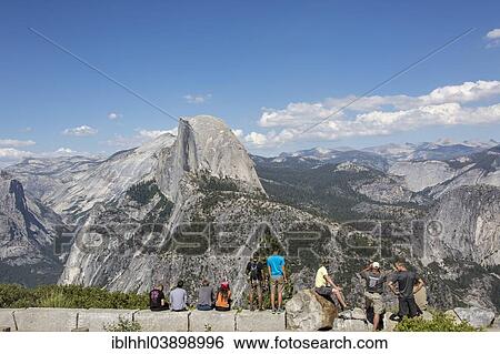 Stock Photograph - "Visitors in front of the Half Dome, Yosemite National Park, California, United States, North America". Fotosearch