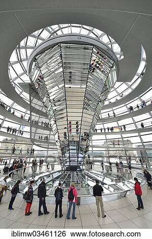 "Visitors in the interior with the mirrored central column of the dome of the Reichstag Building, German Bundestag, architect Sir Norman Foster, Berlin, Berlin, Germany, Europe" View Large Photo Image Stock Photograph - "Visitors in the interior with the mirrored central column of the dome of the Reichstag Building, German Bundestag, architect Sir Norman Foster, Berlin, Berlin, Germany, Europe". Fotosearch