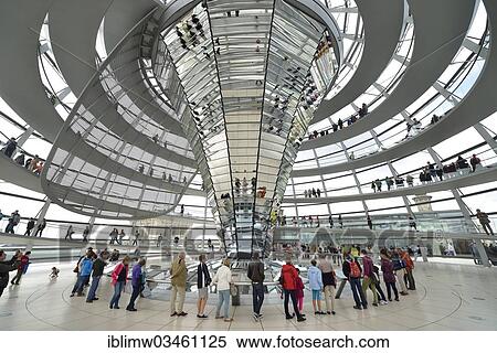 "Visitors in the interior with the mirrored central column of the dome of the Reichstag Building, German Bundestag, architect Sir Norman Foster, Berlin, Berlin, Germany, Europe" View Large Photo Image Stock Photography - "Visitors in the interior with the mirrored central column of the dome of the Reichstag Building, German Bundestag, architect Sir Norman Foster, Berlin, Berlin, Germany, Europe". Fotosearch