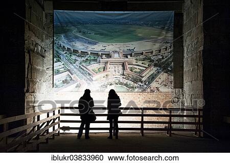 "Visitors observing an aerial view of the airport in a large hall, tour of hidden places at Tempelhof Airport, Berlin, Germany, Europe" View Large Photo Image Stock Image - "Visitors observing an aerial view of the airport in a large hall, tour of hidden places at Tempelhof Airport, Berlin, Germany, Europe". Fotosearch