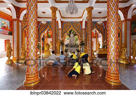 "Visitors praying in front of the altar, columns, Wat Chalong temple, Phuket, Thailand, Asia" View Large Photo Image Stock Image - "Visitors praying in front of the altar, columns, Wat Chalong temple, Phuket, Thailand, Asia". Fotosearch