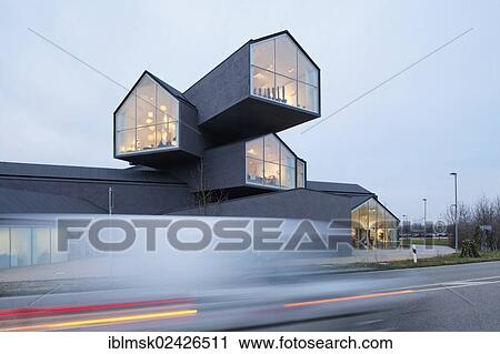 "Vitra Haus building, by Herzog & de Meuron, traffic speeding by, architectural park of the Vitra company, Weil am Rhein, Baden-Wuerttemberg, Germany, Europe" View Large Photo Image Stock Image - "Vitra Haus building, by Herzog & de Meuron, traffic speeding by, architectural park of the Vitra company, Weil am Rhein, Baden-Wuerttemberg, Germany, Europe". Fotosearch