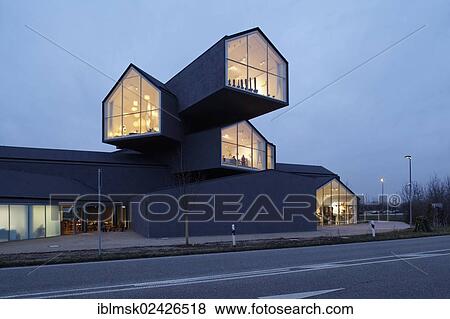 Stock Photo - "Vitra Haus building, by Herzog & de Meuron, evening mood, architectural park of the Vitra company, Weil am Rhein, Baden-Wuerttemberg, Germany, Europe". Fotosearch
