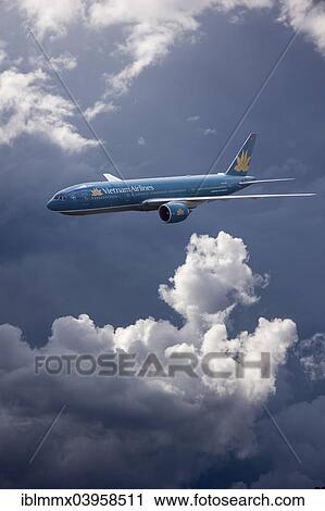 VN-A150 Vietnam Airlines Boeing 777-2Q8 ER in bad weather in flight View Large Photo Image Stock Image - VN-A150 Vietnam Airlines Boeing 777-2Q8 ER in bad weather in flight. Fotosearch