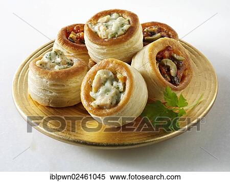 Vol-au-vents filled with salmon and dill cream and olive tapenade View Large Photo Image Stock Photography - Vol-au-vents filled with salmon and dill cream and olive tapenade. Fotosearch