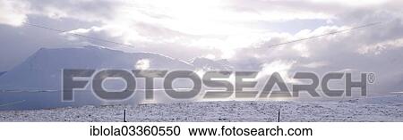 "Volcanic lake with snow capped mountains on Ring Road No 1, North Iceland, Iceland, Europe" View Large Photo Image Stock Image - "Volcanic lake with snow capped mountains on Ring Road No 1, North Iceland, Iceland, Europe". Fotosearch
