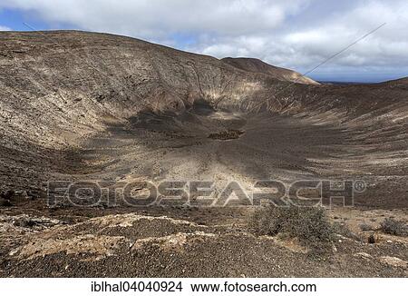 "Volcanic landscape, Fire Mountains, volcanoes, crater of the Caldera Blanca volcano, Lanzarote, Canary Islands, Spain, Europe" View Large Photo Image Picture - "Volcanic landscape, Fire Mountains, volcanoes, crater of the Caldera Blanca volcano, Lanzarote, Canary Islands, Spain, Europe". Fotosearch