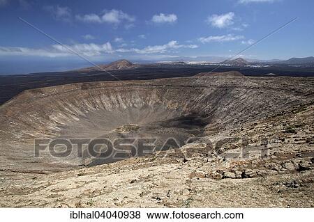 "Volcanic landscape, Fire Mountains, volcanoes, crater of the Caldera Blanca volcano, Lanzarote, Canary Islands, Spain, Europe" View Large Photo Image Stock Photo - "Volcanic landscape, Fire Mountains, volcanoes, crater of the Caldera Blanca volcano, Lanzarote, Canary Islands, Spain, Europe". Fotosearch