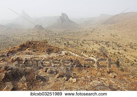 Stock Photo - "Volcanic landscape with the Harmattan haze, Mandara Mountains, Rhumsiki, Far North, Cameroon, Africa". Fotosearch