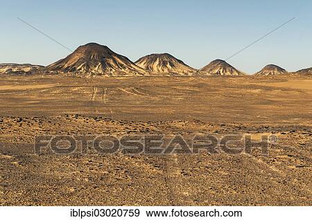 Stock Photo - "Volcanic mountains of Black Desert, Black Desert, Bahariya, Egypt, Africa". Fotosearch